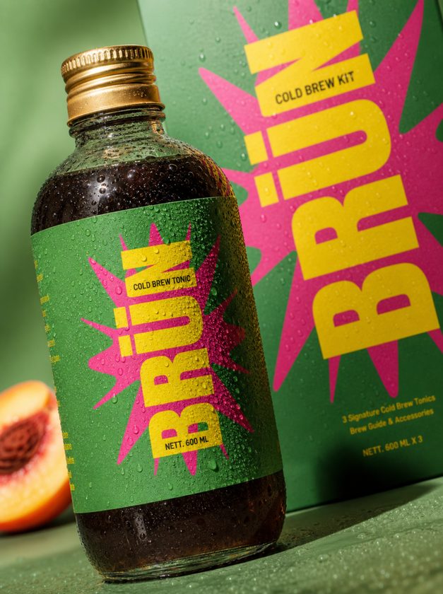 Close-up of the BRÜN Lemongrass bottle with pink starburst label